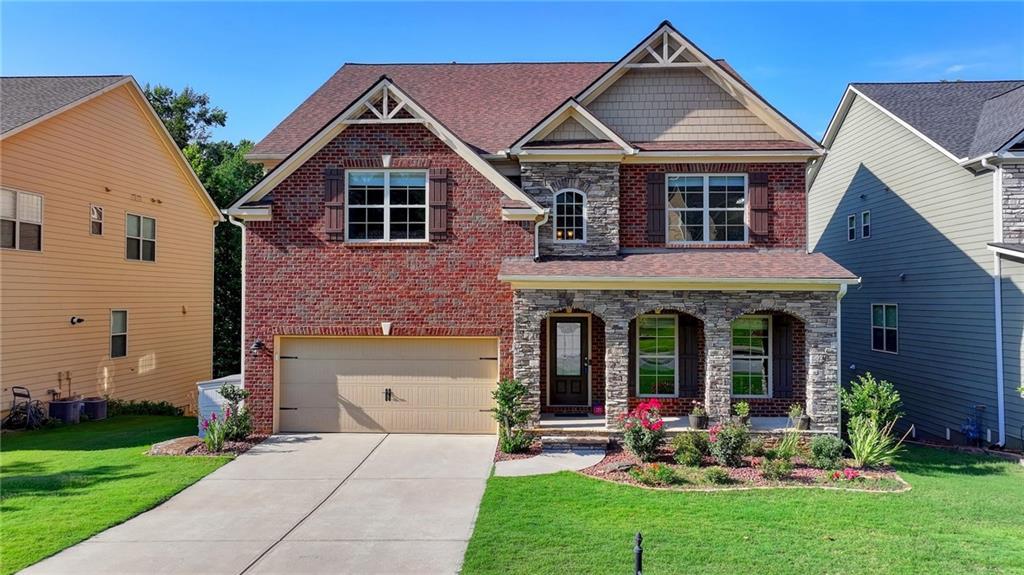 Cumming, GA 30040 | 5 beds | 4 baths | $699,900